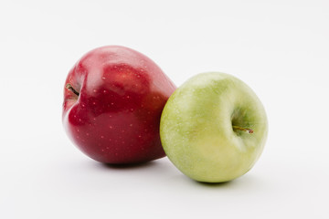 tasty ripe red and green apples on white background
