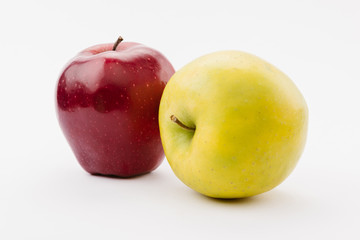 fresh golden and red delicious apples on white background