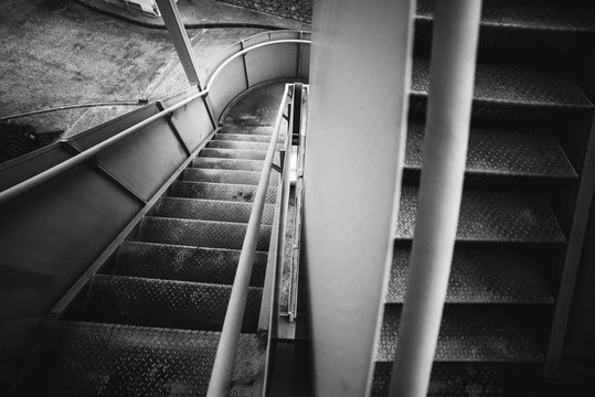 Metal spiral stairway inside jail in Oviedo, Spain