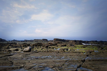Coral beach at the sunrise, at Indonesia 