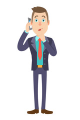 Obraz premium Businessman talking on mobile phone and standing with his finger to his lips