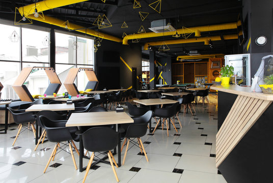 Interior Industrial Cement Loft Design Concept Modern Cafe , Restraunt. With Place For Children.