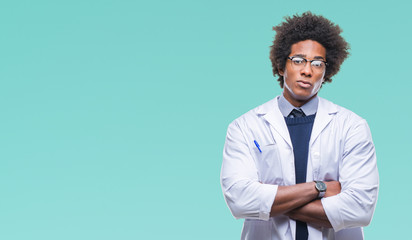 Afro american doctor scientist man over isolated background skeptic and nervous, disapproving...