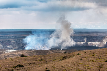 Crater of the Kilauea Volcano on Big Island, Hawaii spits smoke