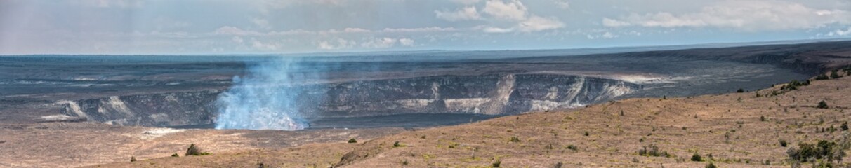 Crater of the Kilauea Volcano on Big Island, Hawaii spits smoke © susanne2688