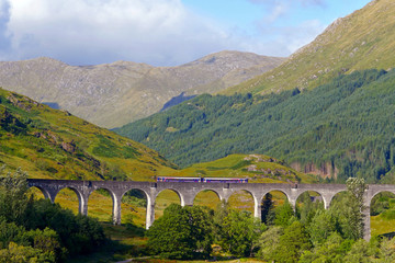 Scottish landscapes: Glenfinnan Viaduct with a train on it