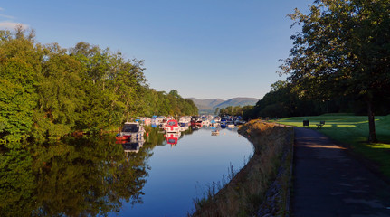 Balloch, Scotland / United Kingdom - August 2014: Boats anchored at River Leven nearby Loch Lomond