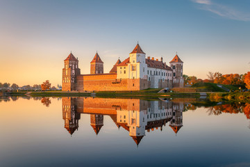 Naklejka na ściany i meble Mir castle in the sunsetlight. Belarus