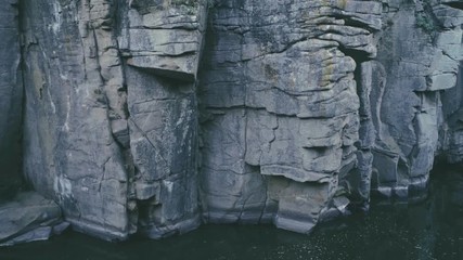 Mountain river running at sharp split rocks in the Carpathians in summer
