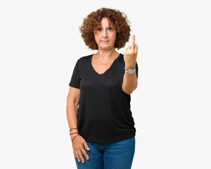 Beautiful middle ager senior woman over isolated background Showing middle finger, impolite and...