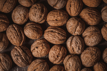 full frame of walnuts arranged as backdrop