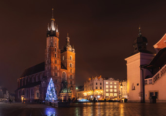 Market Square Rynek of the Old City in Krakow decorated by the christmas lights. Poland
