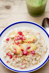 Porridge with bananas and raspberries 