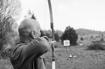 archer aiming bow