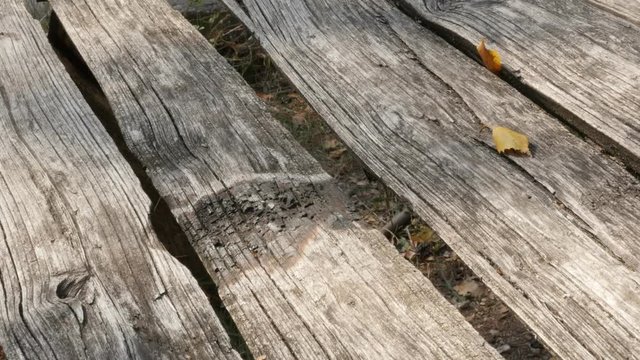 Table made of weathered wooden planks 4K footage