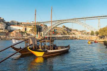 Fototapeta na wymiar The Dom Luis I Bridge, is a double-deck metal arch bridge that spans the river Douro between the cities of Porto and Vila Nova de Gaia in Portugal
