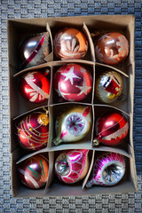 vintage old christmas decorations in boxes