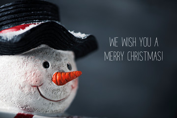snowman and text we wish you a merry christmas