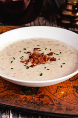 Creamy potato soup with bacon topping