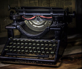 old typewriter on wooden background