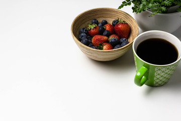 Refreshing snack with berries and coffee