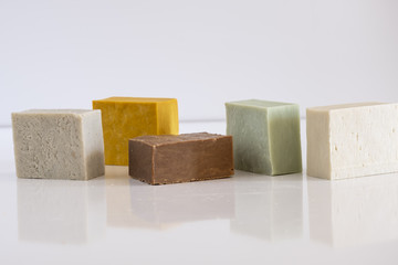 Natural handmade soap bars isolated on white