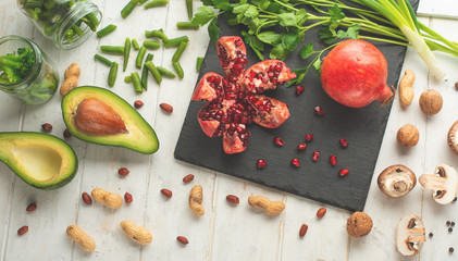 Winter vegetarian, vegan food cooking ingredients. Flat lay of vegetables, fruits, beans, kitchen...