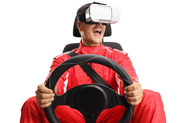 Racer in a car seat holding a steering wheel and wearing VR headset © Ljupco Smokovski