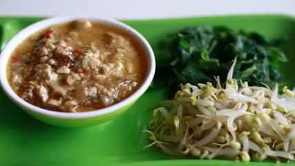 Sprouting, spinach and sambal tumpang. Sambal Tumpang is tempe in spicy coconut sauce.