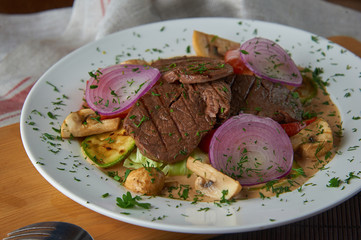 Homemade Slow Cooker Pot Roast with with mushrooms and vegetables