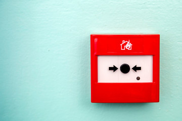 fire alarm button on the wall