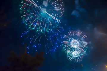 blue bright blurred fireworks effect abstract colorful background holiday 