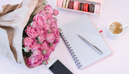 planning notebook with pen, telephone,