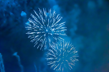 blue bright blurred fireworks effect abstract colorful background holiday 