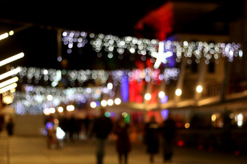 Fototapeta premium Christmas atmosphere in the city, defocused.