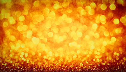 Gold glittery party bokeh background.