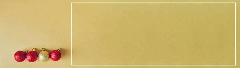 web banner design for elegant holiday party event and celebration concept for shimmer and shine gold and red ball decorate on gold glitter background