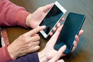 Handle the tablet at hand