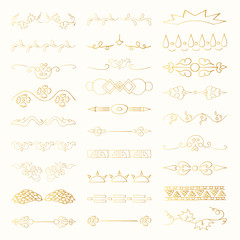 Vintage hand drawn golden dividers, lines, calligraphic borders and ornate laurels set. Vector isolated elements. 