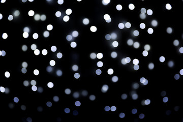 Abstract bokeh lights Christmas background for your design.