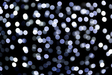 Abstract bokeh lights Christmas background for your design.