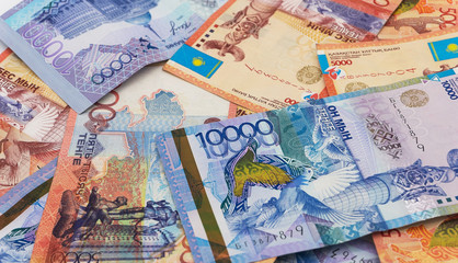 Fototapeta na wymiar Kazakhstan money bills background texture. tenge banknotes