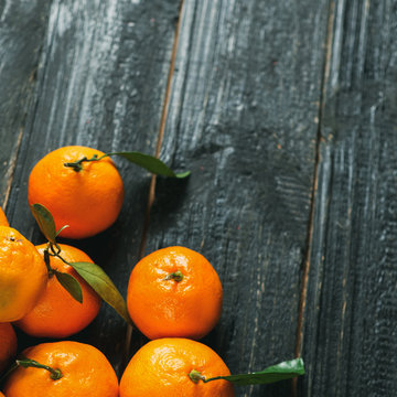 Bright juicy tangerines closeup with copy space