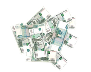 Obraz na płótnie Canvas Russian banknotes of one thousand rubles isolated on white background