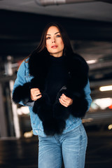 Gorgeous woman posing in luxurious fur coat