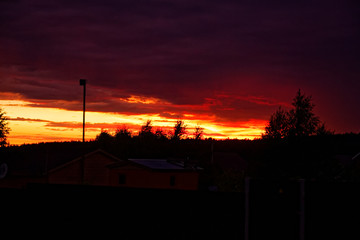 colorful sunset in summer in the countryside