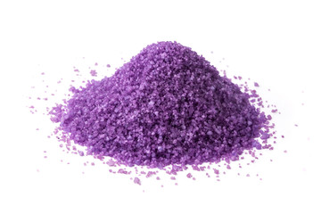 Small pile of purple bath salts on the white background