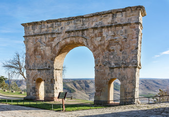 Fototapeta na wymiar The Arch of Medinaceli is a unique example of monumental Roman triumphal arch within Hispania. Located in Medinaceli, province of Soria, it is the only one of three spans existing in Spain.