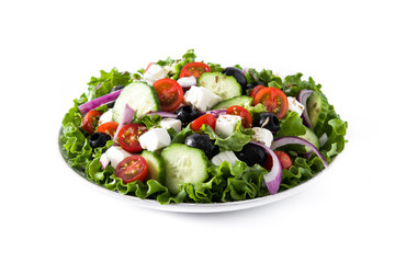 Fresh Greek salad in Plate with black olive,tomato,feta cheese, cucumber and onion isolated on white background