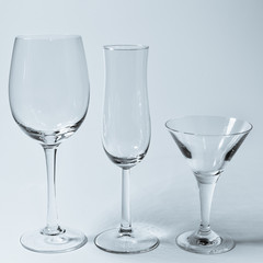 Empty glasses for wine, champagne and  drinks on white background.